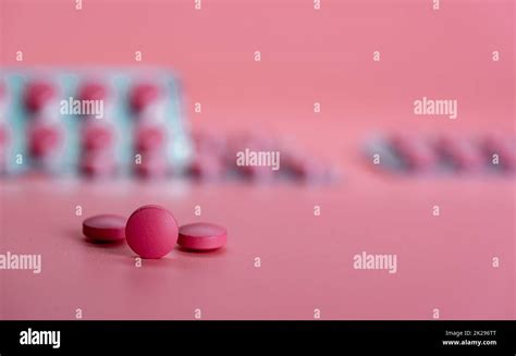 Round Pink Tablet Pill On Blur Blister Pack Prescription Drug