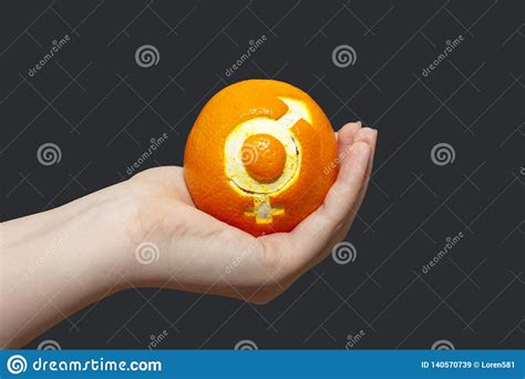 Gender Equality Orange With The Sign Of Gender Equality In The Hand Of