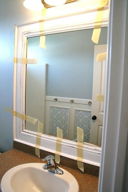 Big bathroom mirror ideas on wall. This reminds me of a tip with mirrors- buy a cheap ...