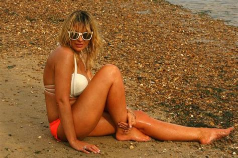 Eastenders Kierston Wareing Shows Off Her Stunning Curves As She Cools Off In The Sea In