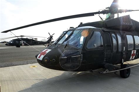 A Uh 60 Black Hawk Helicopters Sit On The Flightline Nara And Dvids