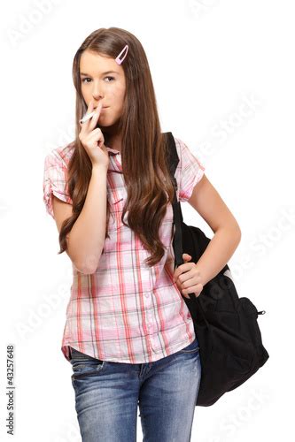 Portrait Of A Teenage Girl Smoking A Cigarette Buy This Stock Photo