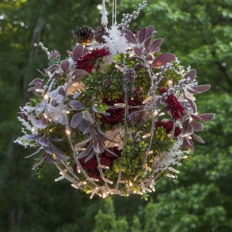 Make your days at home a little brighter. DIY Flower Christmas Light Balls