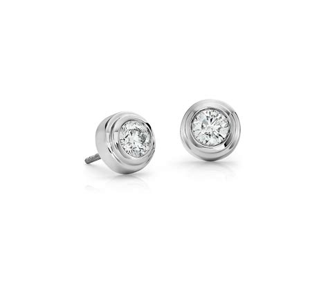 Earring sets are perfect for numerous piercings or just to mix and match! Diamond Bezel Stud Earrings in 18k White Gold (1.20 ct. tw.) | Blue Nile