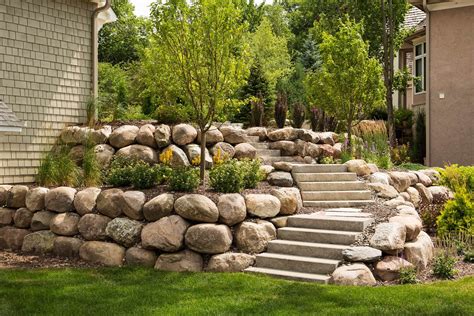 Two Tiered Boulder Backyard Boulder Wall Terraces Landscaping With