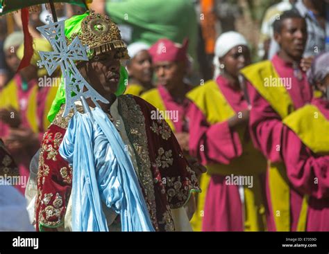 Ethiopian Orthodox Priests Holding Sacred Crosses During The Colorful