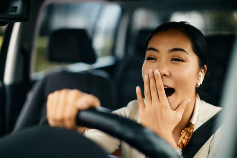 Woman Yawning Car Stock Photos Pictures And Royalty Free Images Istock