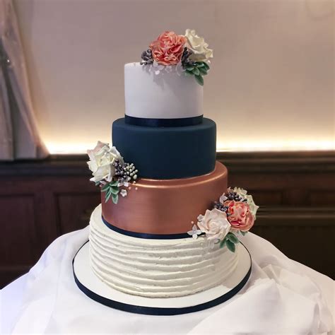 Thank you for stopping by emma loves weddings blog. Rose gold and navy wedding cake #rosegold #weddingcake # ...