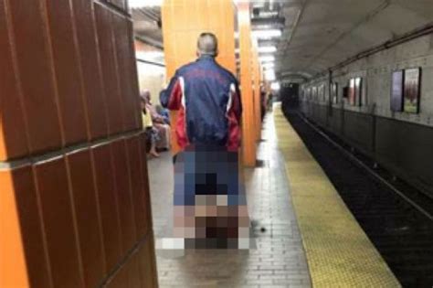 Woman Performs Sex Act On Man In Front Of Shocked Passengers On Subway Platform Mirror Online
