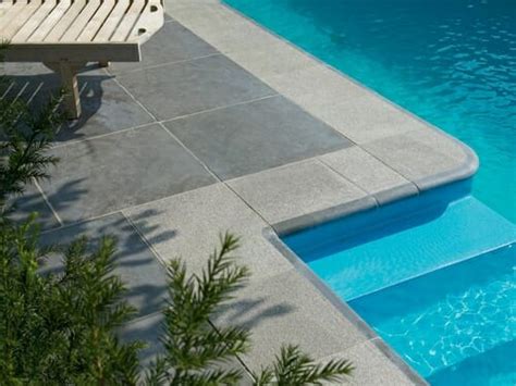 Concrete at pool coping is cantilevered over the pools edge. Raven Grey Granite - Granite Pavers, Tiles, Paving ...