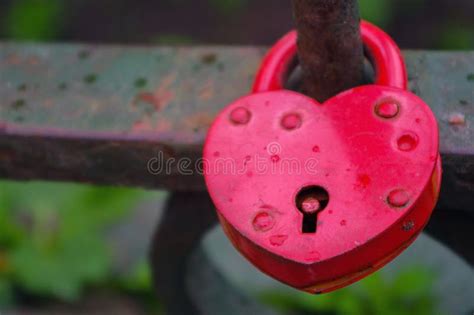 Beautiful Red Heart Shaped Padlock Locked On Iron Chain Stock Image