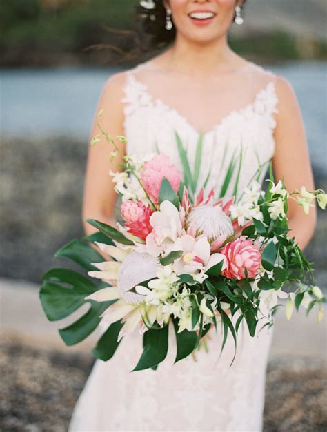 Tropical Bridal Bouquet With King Protea Ginger Orchids And Monstera