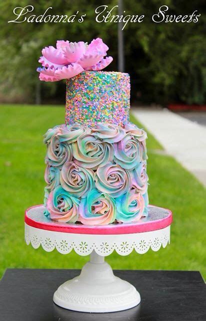 Colorful Pastel Rainbow Cake Adorned With A Beautiful Peony Flower