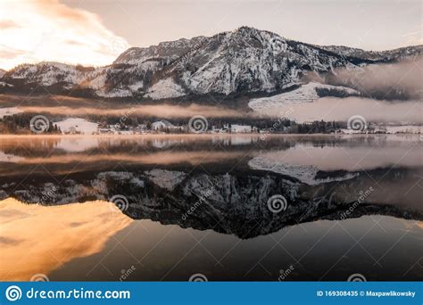 Mountain Lake In Winter With Reflection During Sunset Stock Image