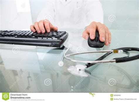 Close Up Of Doctor Using Computer Stock Image Image Of Desk