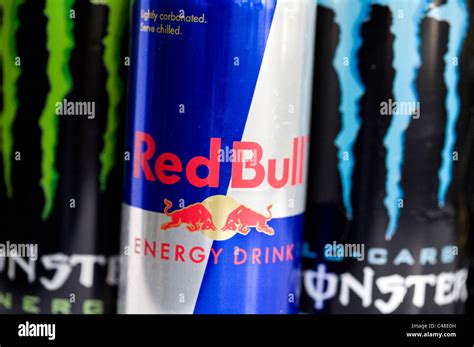 A Mix Os Rockstar Monster Amp And Red Bull Energy Drinks Stock Photo