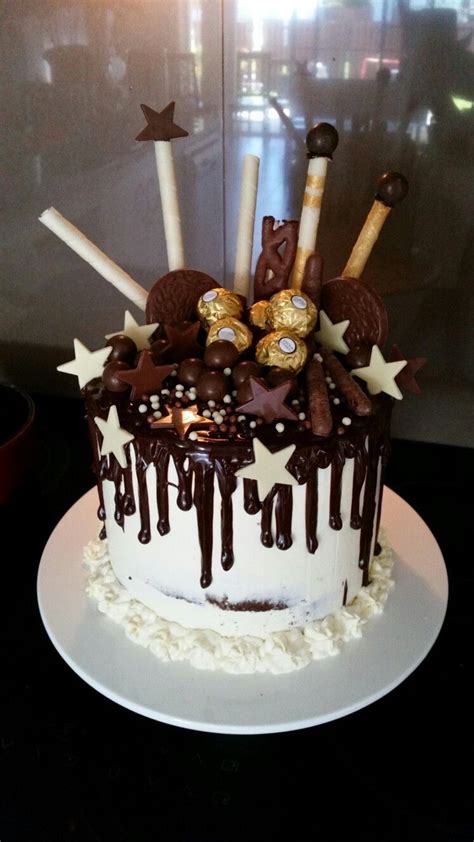 A birthday cake is a cake eaten as part of a birthday celebration. Birthday drip cake | Tortas con golosinas, Tortas, Tortas ...
