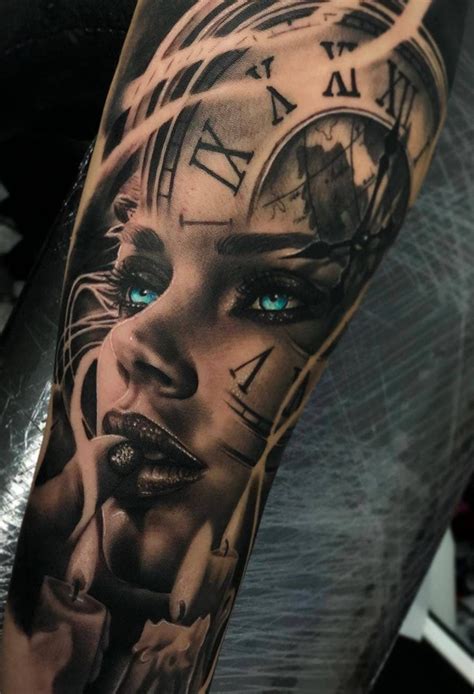 A Woman With Blue Eyes And Clock Tattoo On Her Arm