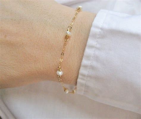 White Pearl Bracelet Made With 7 White Freshwater Pearls In A Dainty