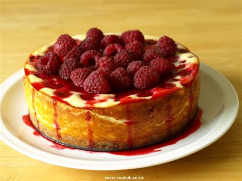 Meanwhile, mix together the cream cheese, greek yogurt, double cream, zest and juice of 1½ lemons and the caster sugar in a bowl. Raspberry Cheesecake recipe - CookUK