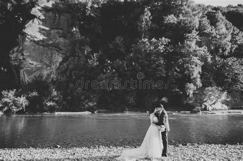 Wedding Couple Groom And Bride Hugging Outdoor Near River Stock Image Image Of Woman Girl