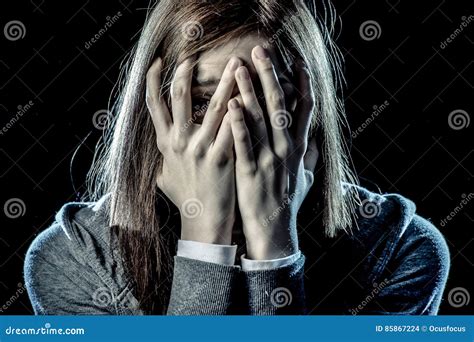 Teenager Girl In Stress And Pain Suffering Depression Looking Sad And