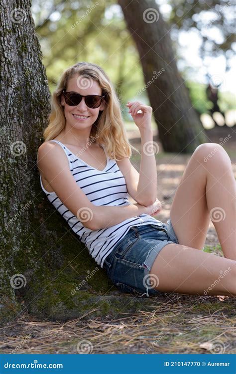 Portrait Woman Leaning Against Tree Stock Photo Image Of Caucasian