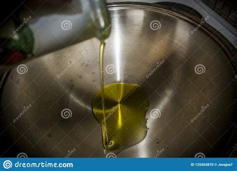 Olive Oil In A Pan Stock Photo Image Of Action Ingredient 125503870