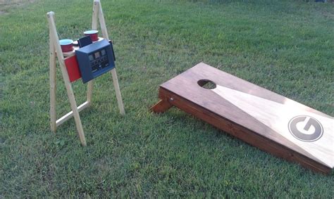 Corn Hole Score Board Cup Holder Phone And Speaker Holder Folds Up