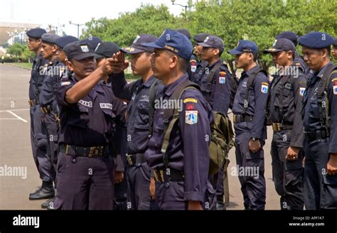 Indonesian Police Officers In Central Jakarta Practising Marching And