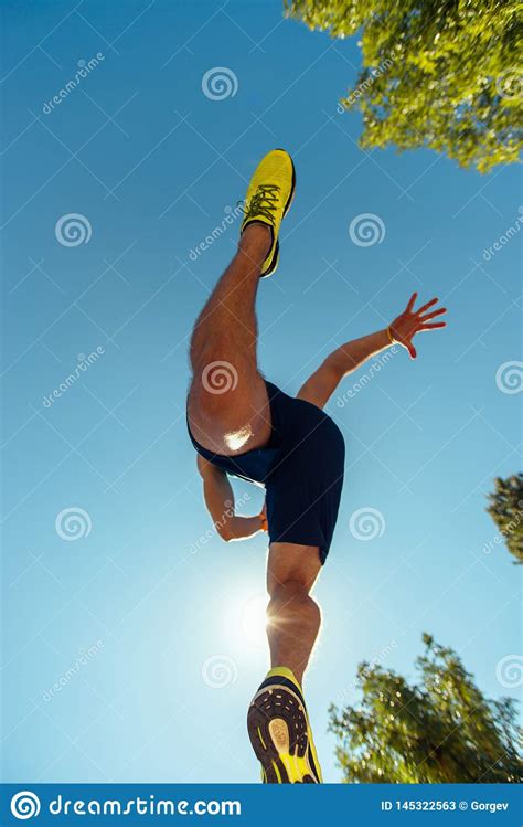 Running Sneakers From Bottom On Mans Leg Stock Image Image Of Exercising Shoes
