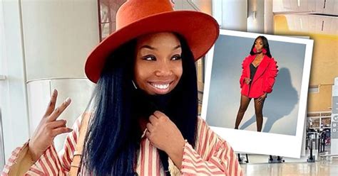 Brandy Flaunts Her Long Legs While Posing In A Skimpy Black Outfit And Red Blazer