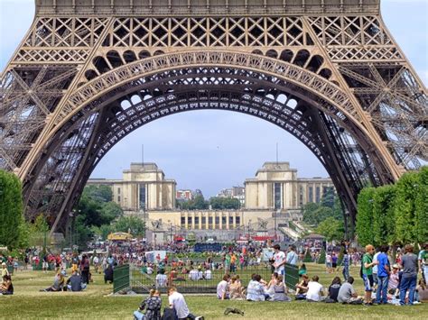 People Resting On Lawn At Eiffel Tower At Summer France Paris Free