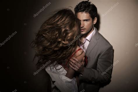Handsome Guy With His Sensual Girlfriend Stock Photo By Konradbak