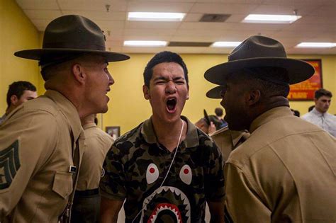 A New Recruit With Fox Company 2nd Recruit Training Battalion Responds To Drill Instructors