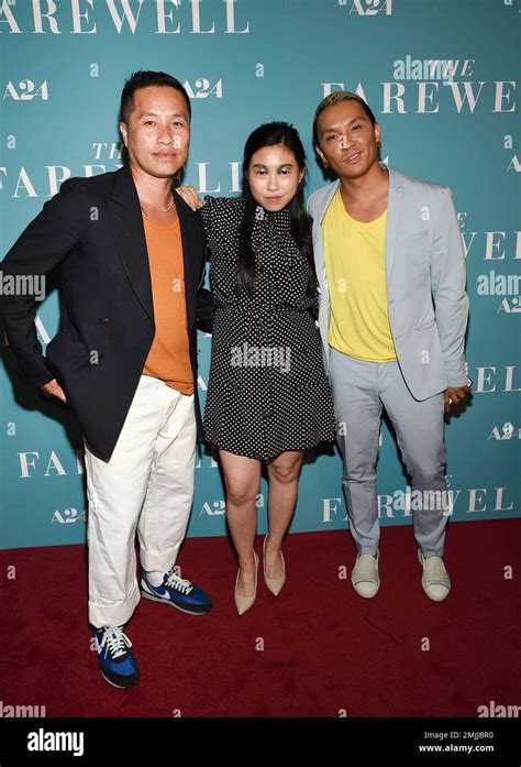 Actress Awkwafina Center Poses With Designers Phillip Lim Left And