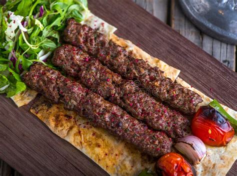Iraqi Beef Seekh Kabab Platter Served In Dish Side View On Wooden Table