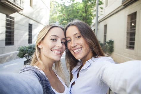 Friends Making Selfie Two Beautiful Young Women Making Selfie Stock Image Image Of Looking