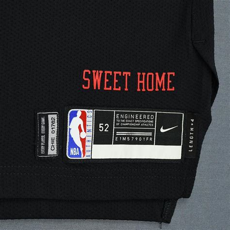 What material is this item made of? Bobby Portis - Chicago Bulls - Game-Issued City Edition Jersey - 2018-19 Season | NBA Auctions