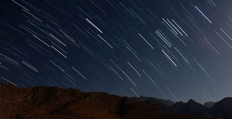 Star Trails Over The Mountains In Night Sky Image Free