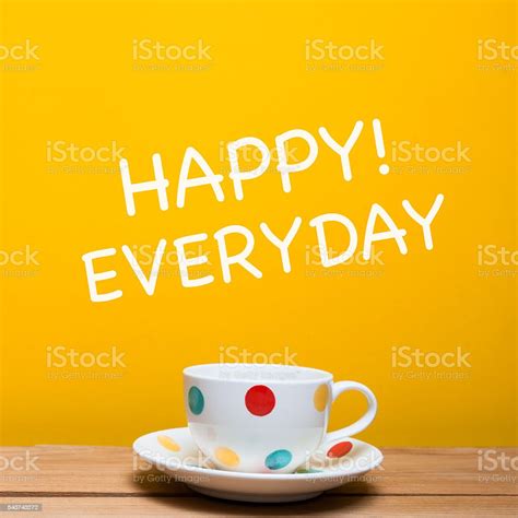 Happy Everyday Word With Coffee Cup On Yellow Background Stock Photo