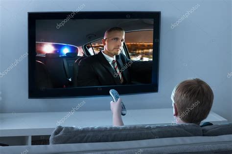 Boy Watching Movie On Television Stock Photo By ©andreypopov 119665648