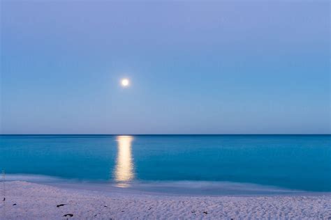 Moonrise Over The Beach And Sunset By Stocksy Contributor Gillian