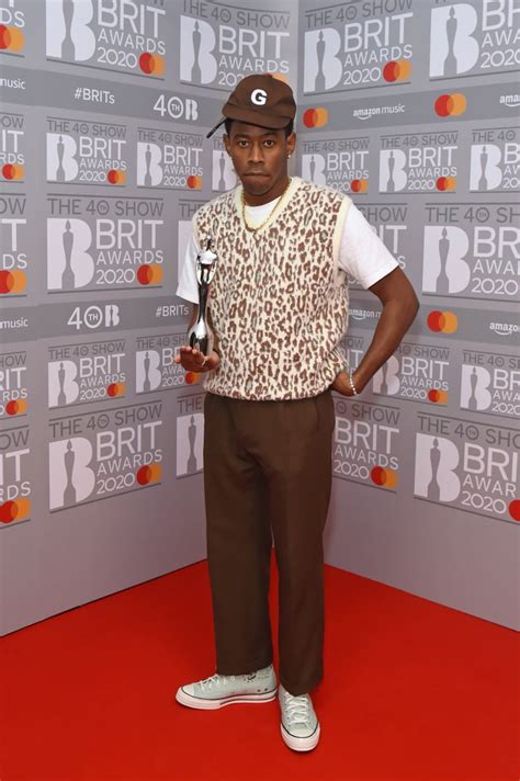 At The 2020 Brit Awards Tyler Posed With His Award Wearing A Funky