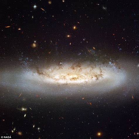 Pictured Hubble Telescope Captures Galaxies Stripping Daily Mail