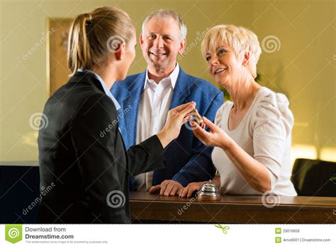 Reception - Guests Check In A Hotel Royalty Free Stock Photos - Image: 29016658