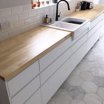 Beautiful thunder white granite worktops and matching island pairs. Kitchen Reveal - Ikea units, white, handleless, black tap ...
