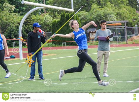 Female High School Athlete Throws The Javelin Editorial Stock Image