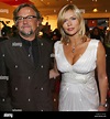 German actress Veronika Ferres (R) and her husband Martin Krug arrive ...