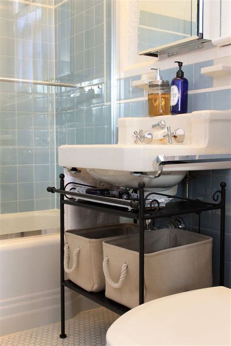 Don't let a cluttered bathroom take over. bathroom storage under pedestal sink | Pedestal sink ...